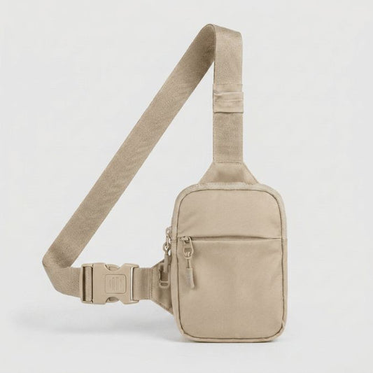 Bandolera Travel Sling en color Sand, vista frontal